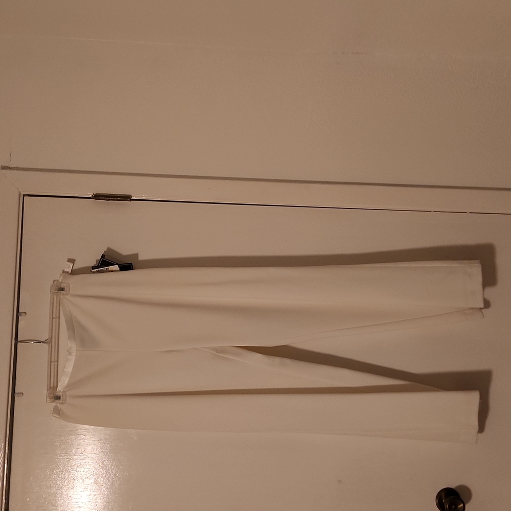 Off White dress pants with side zipper! Never worn.